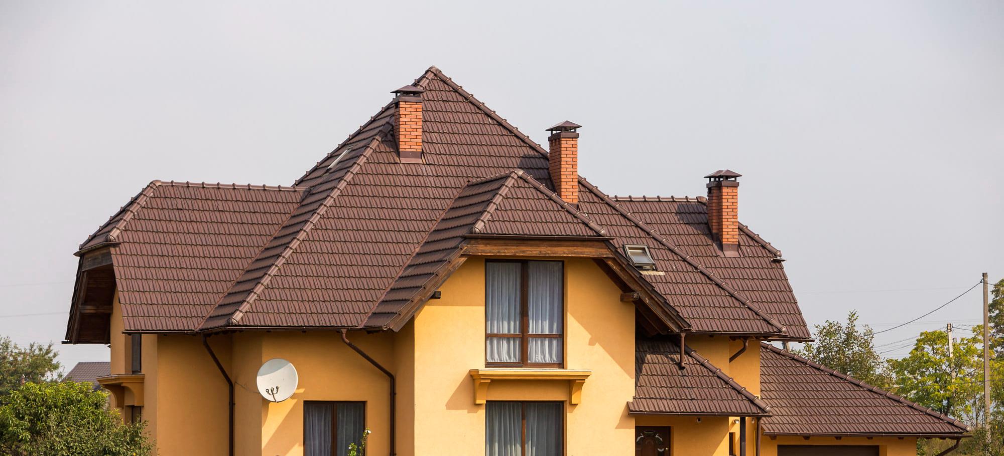 Крыши частных домов: как правильно выбрать форму и уклон